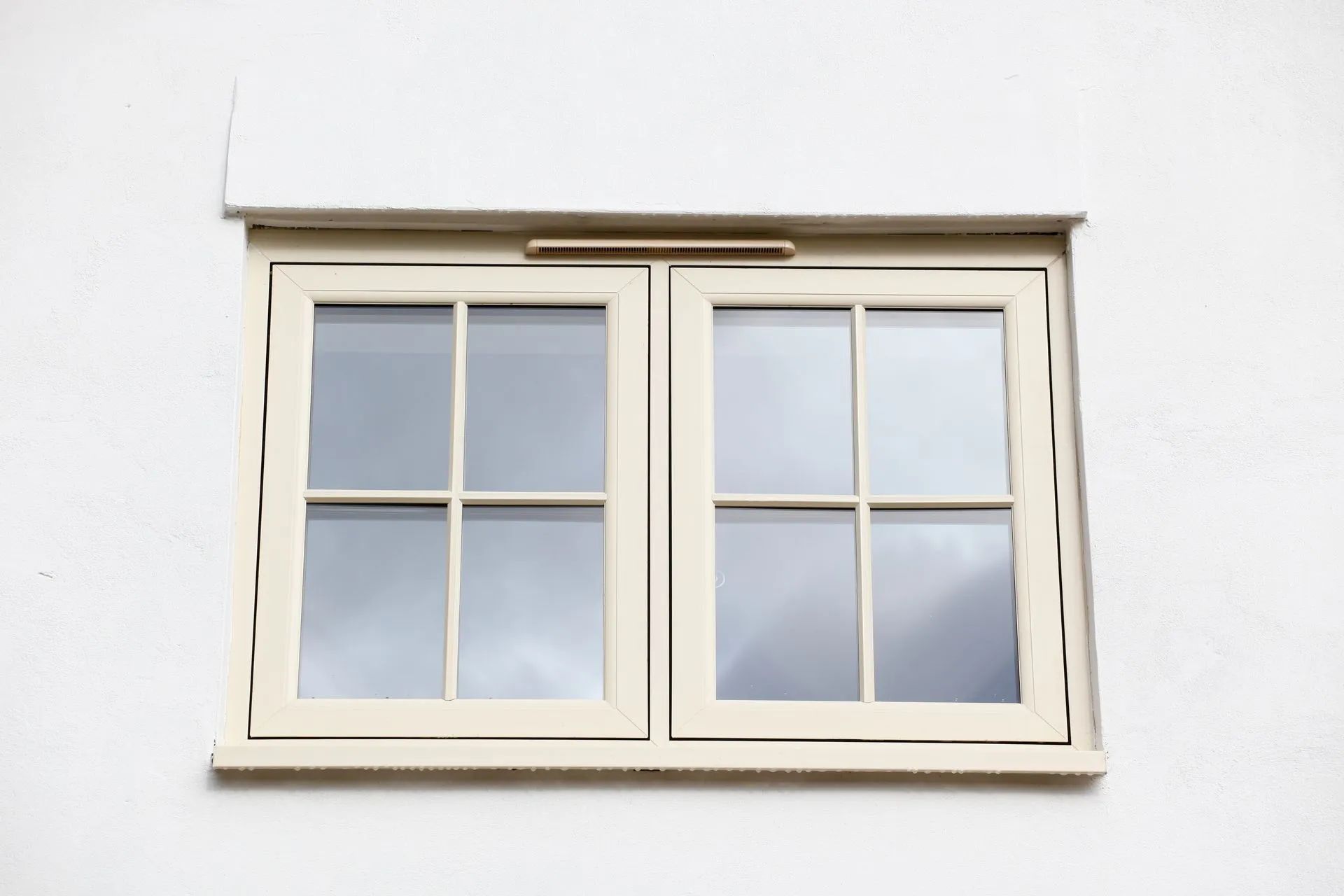 cream flush sash windows white house