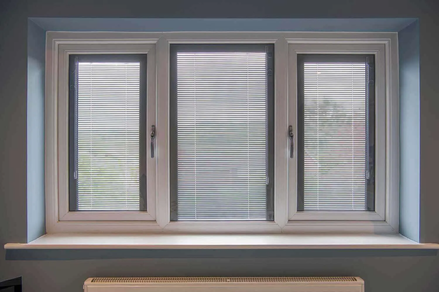 windows with internal blinds
